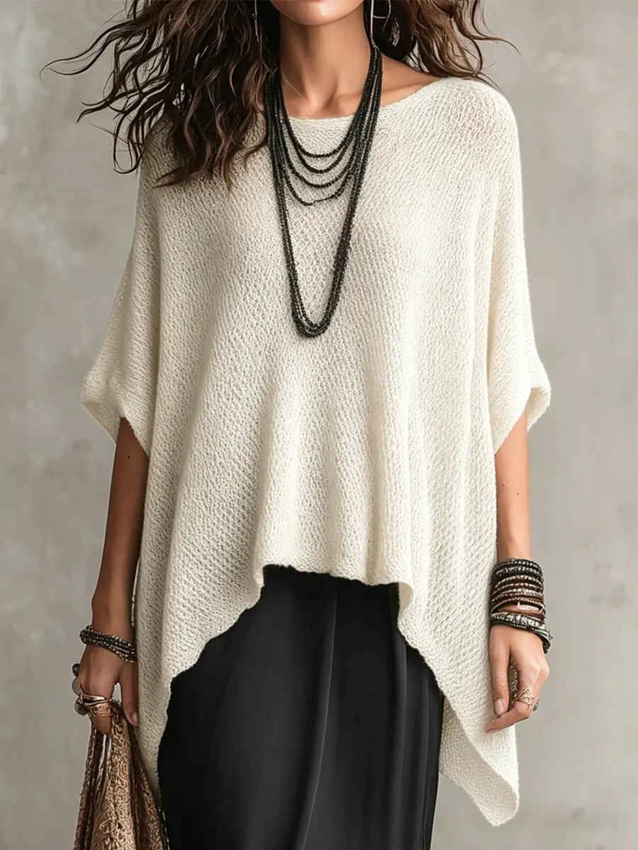 White batwing open knit poncho
