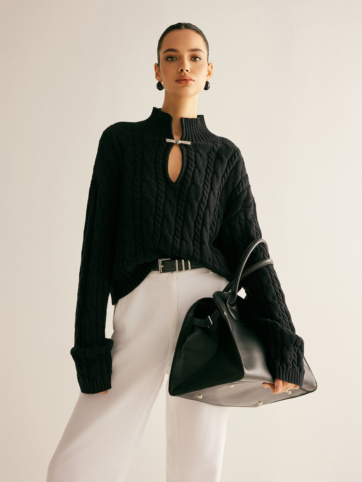 Cable knit keyhole high neck jumper