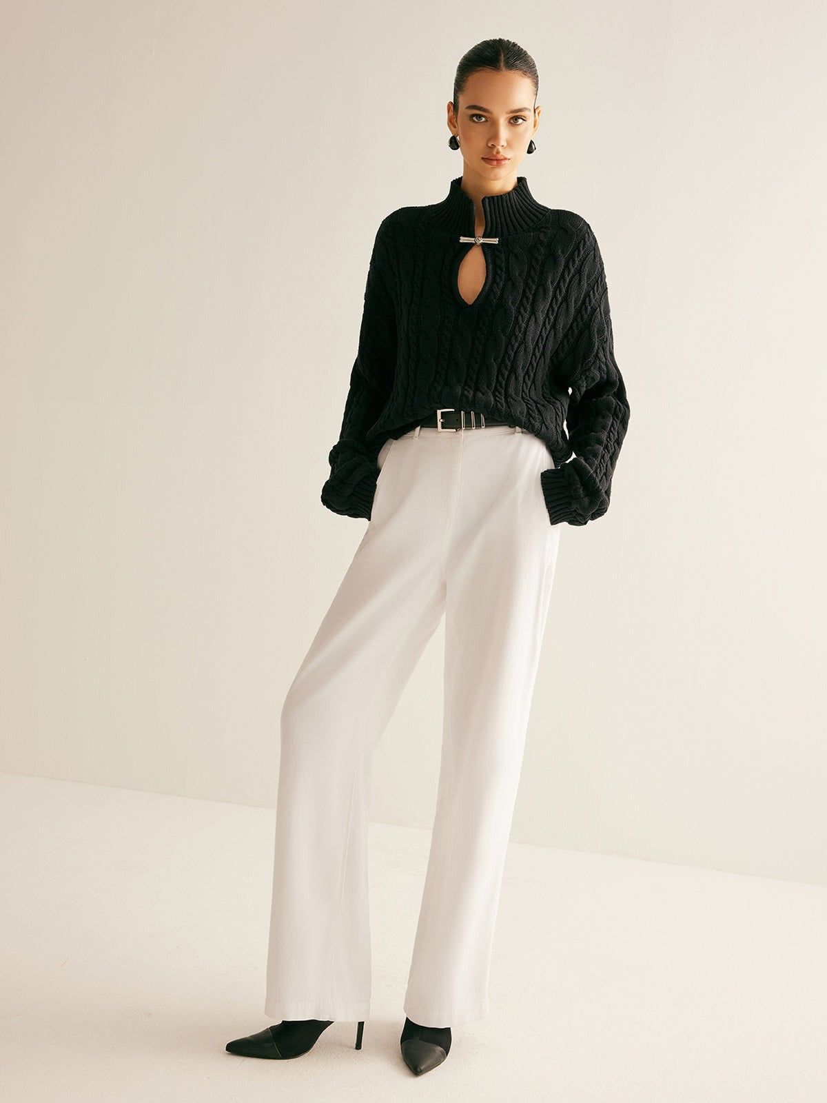 Cable knit keyhole high neck jumper
