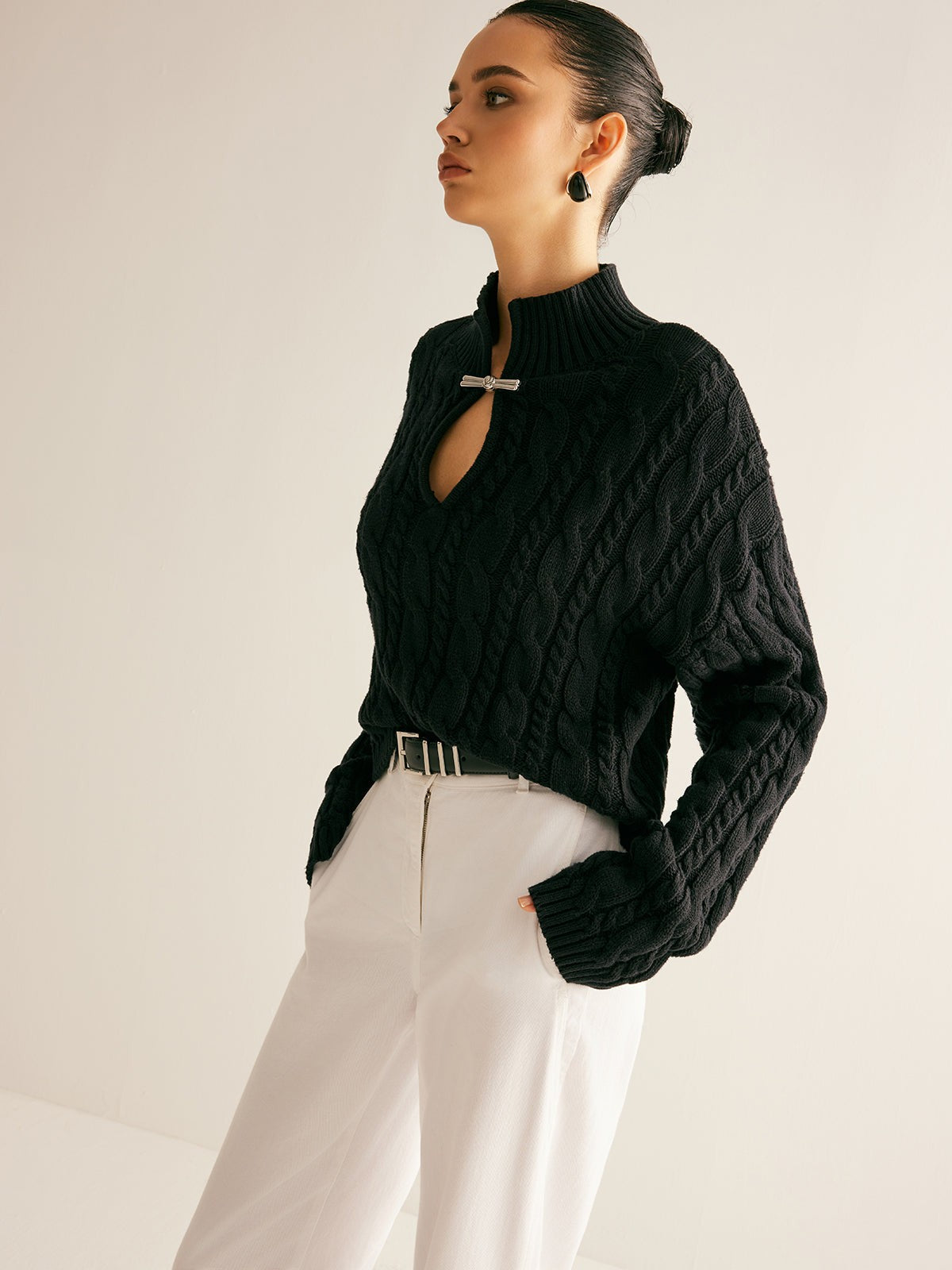 Cable knit keyhole high neck jumper