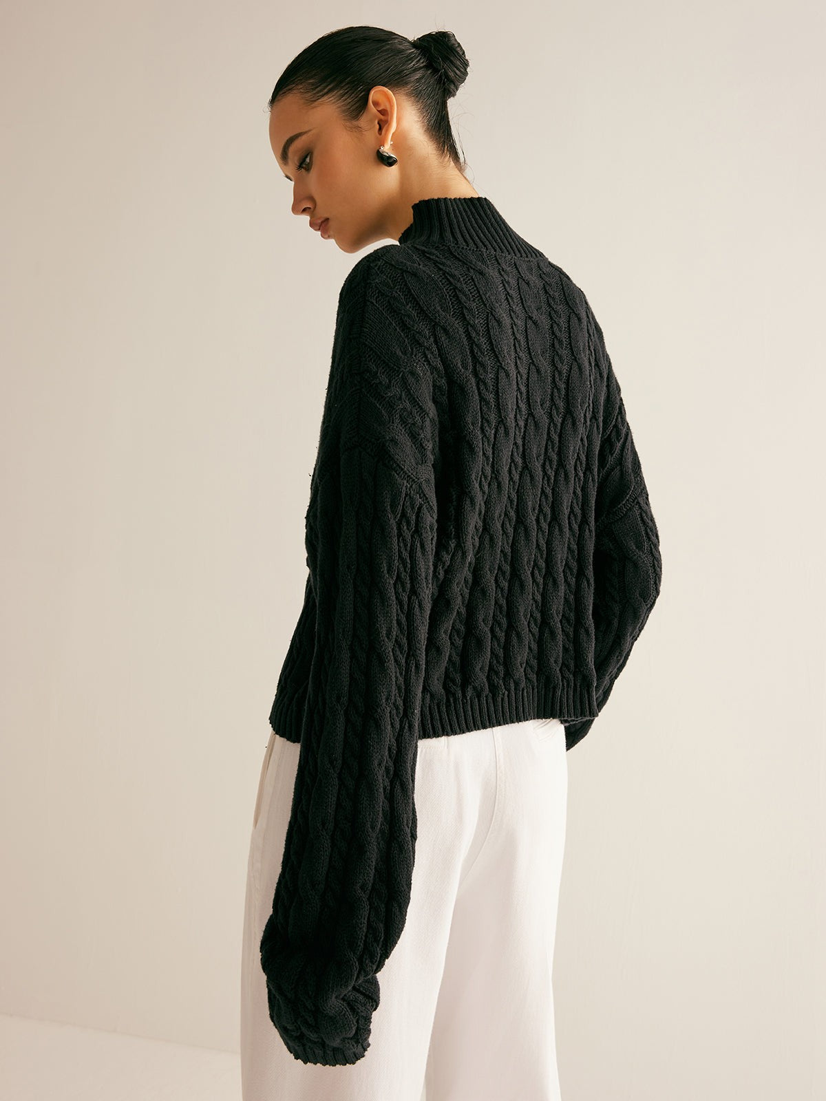 Cable knit keyhole high neck jumper