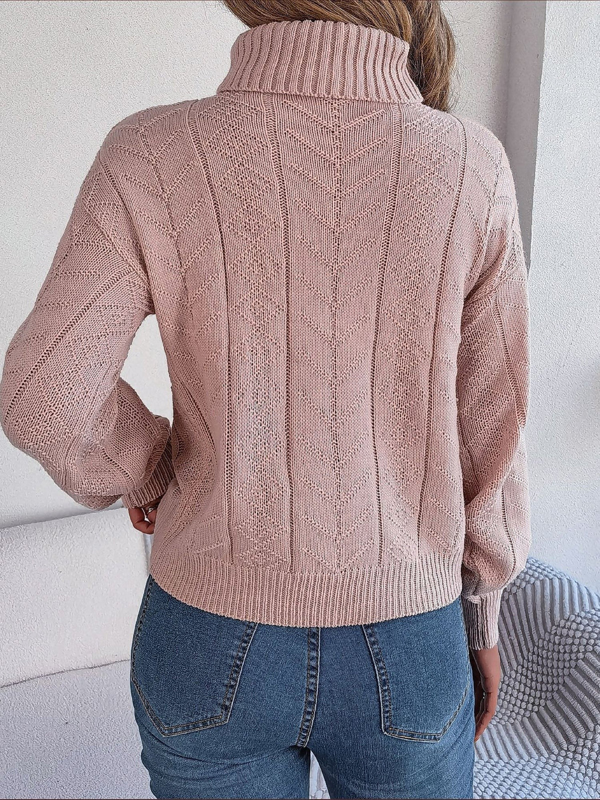Cable-knit roll neck jumper