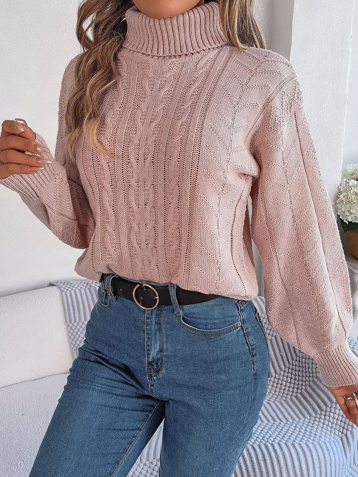 Cable-knit roll neck jumper
