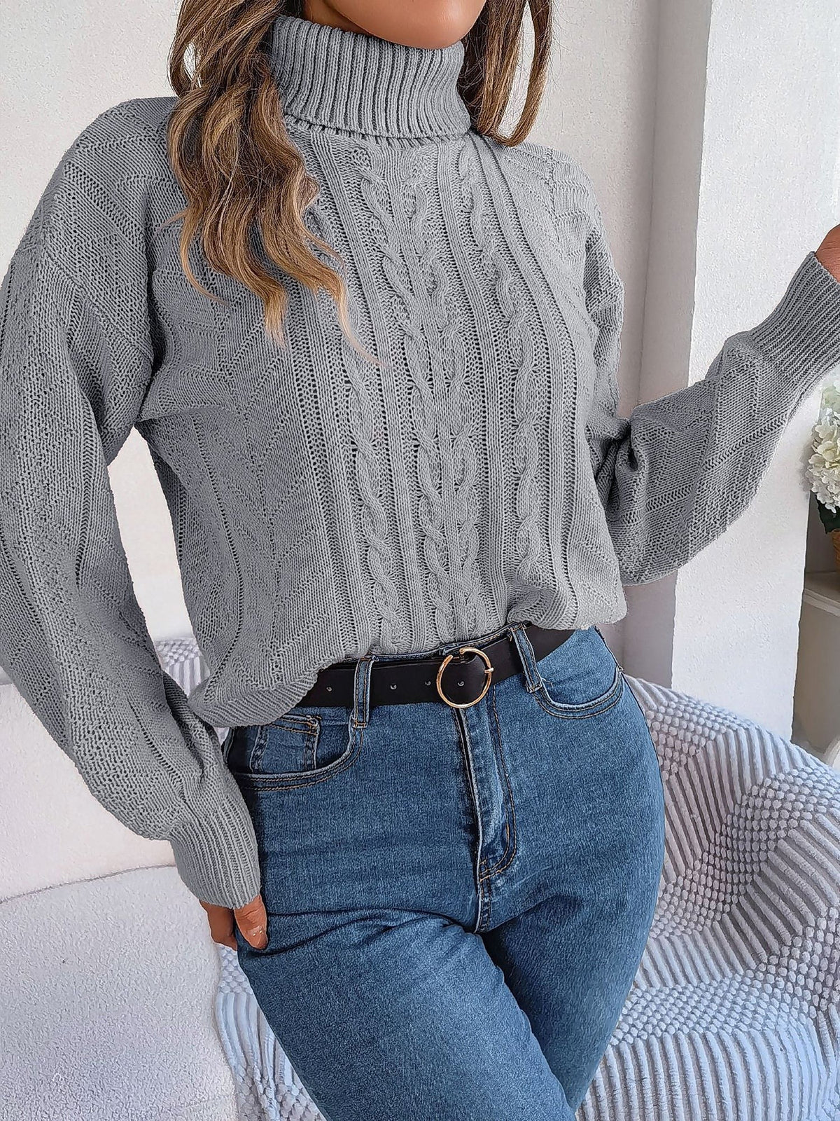 Cable-knit roll neck jumper
