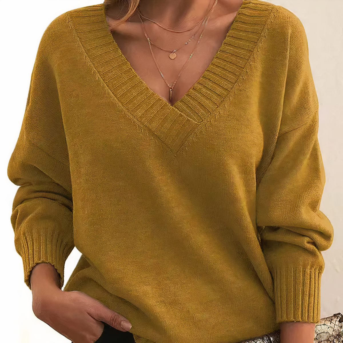 Bridget | Jersey plisado con cuello de pico