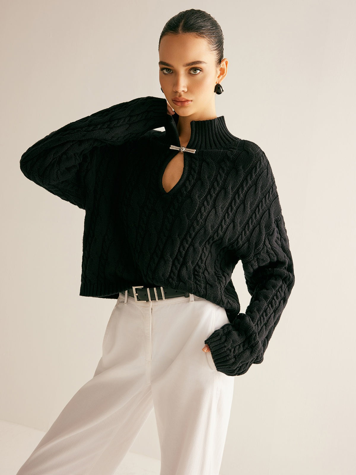 Cable knit keyhole high neck jumper