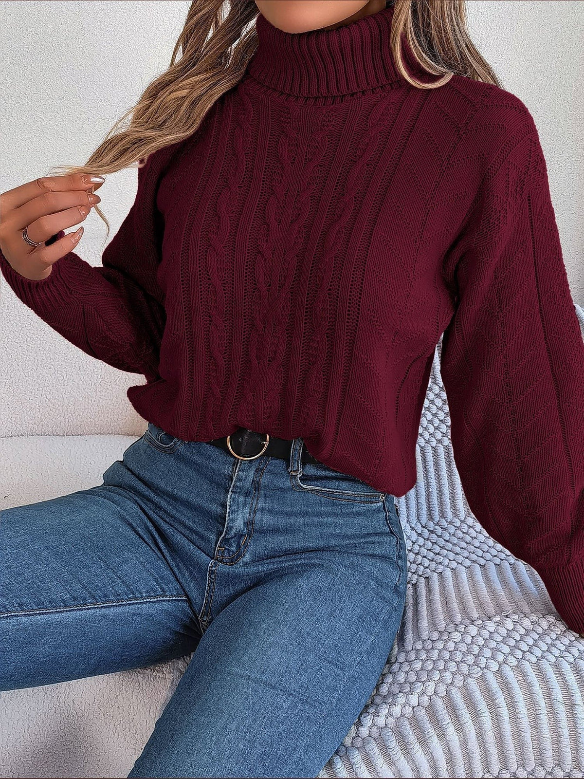 Cable-knit roll neck jumper