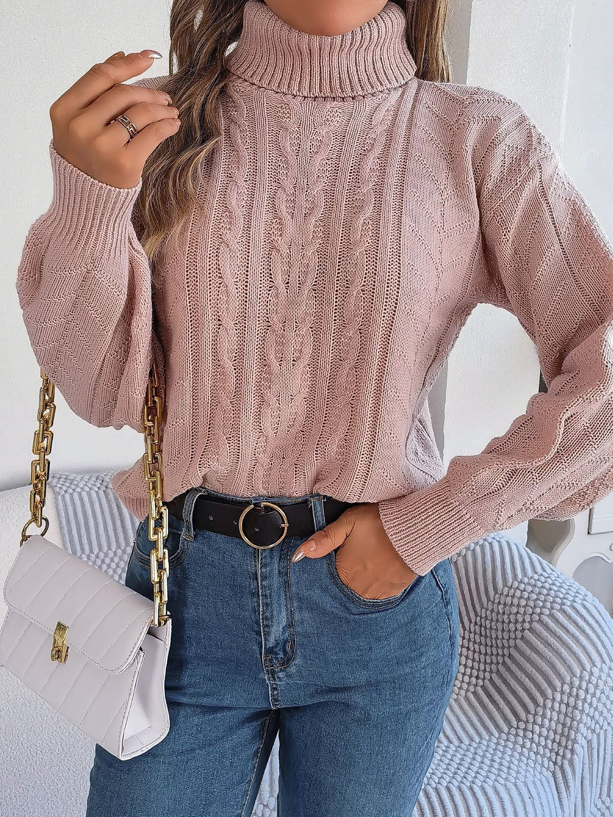 Cable-knit roll neck jumper