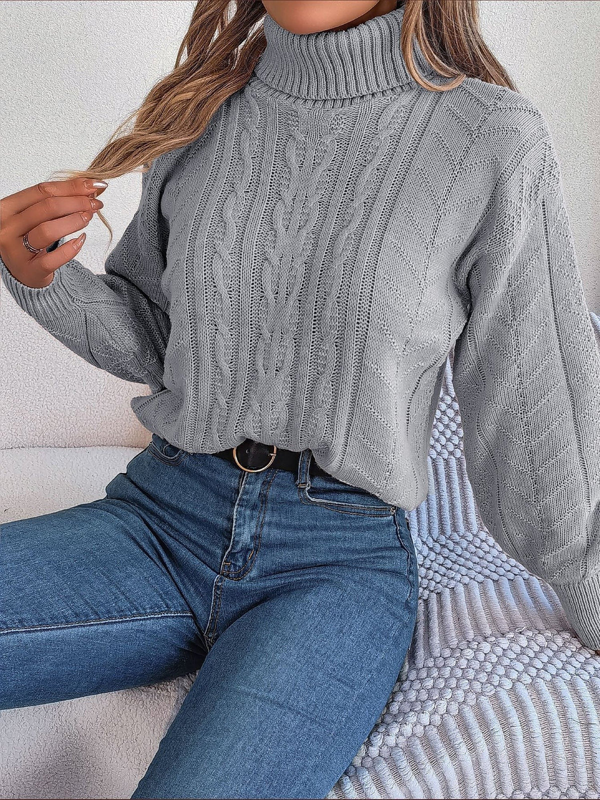 Cable-knit roll neck jumper