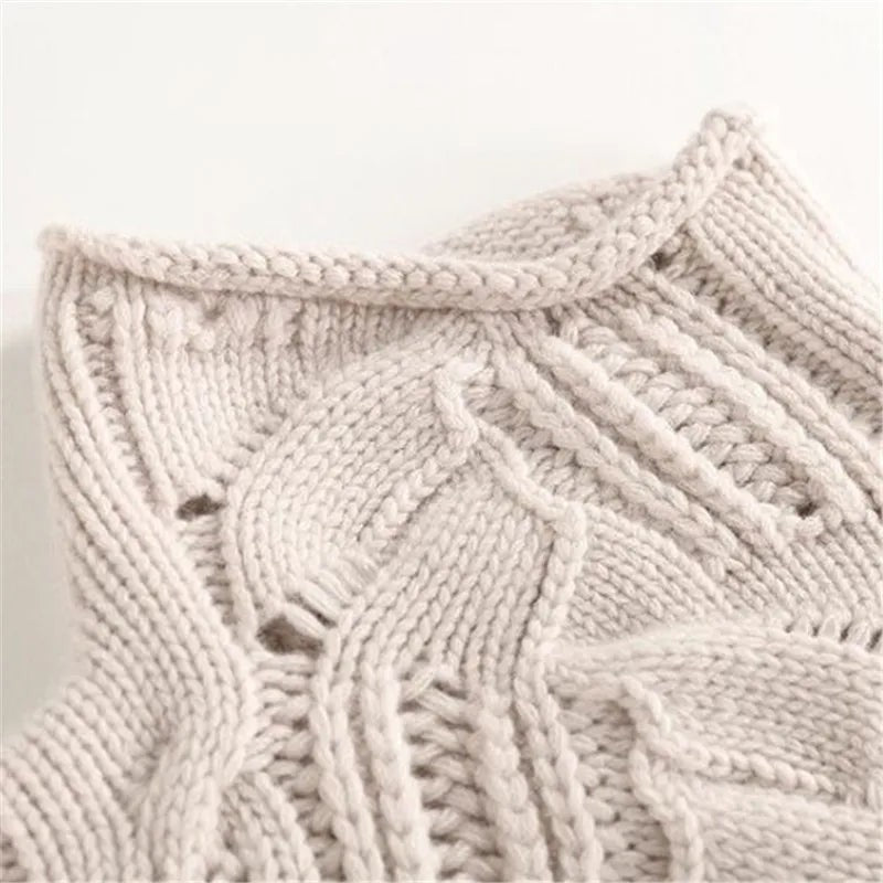 Chunky cable-knit roll neck jumper