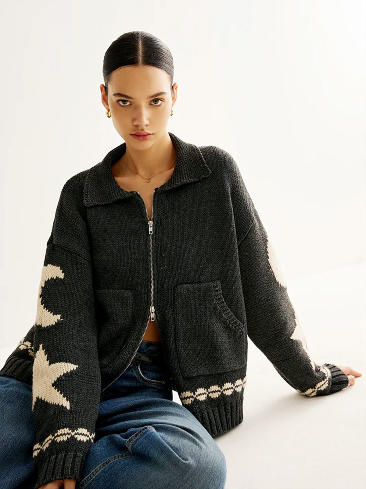 Black star-motif zip-up cardigan